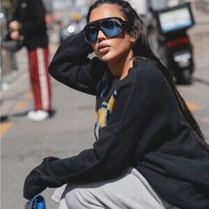 Tom Ford Sunglasses with Black Frame and Blue Lenses